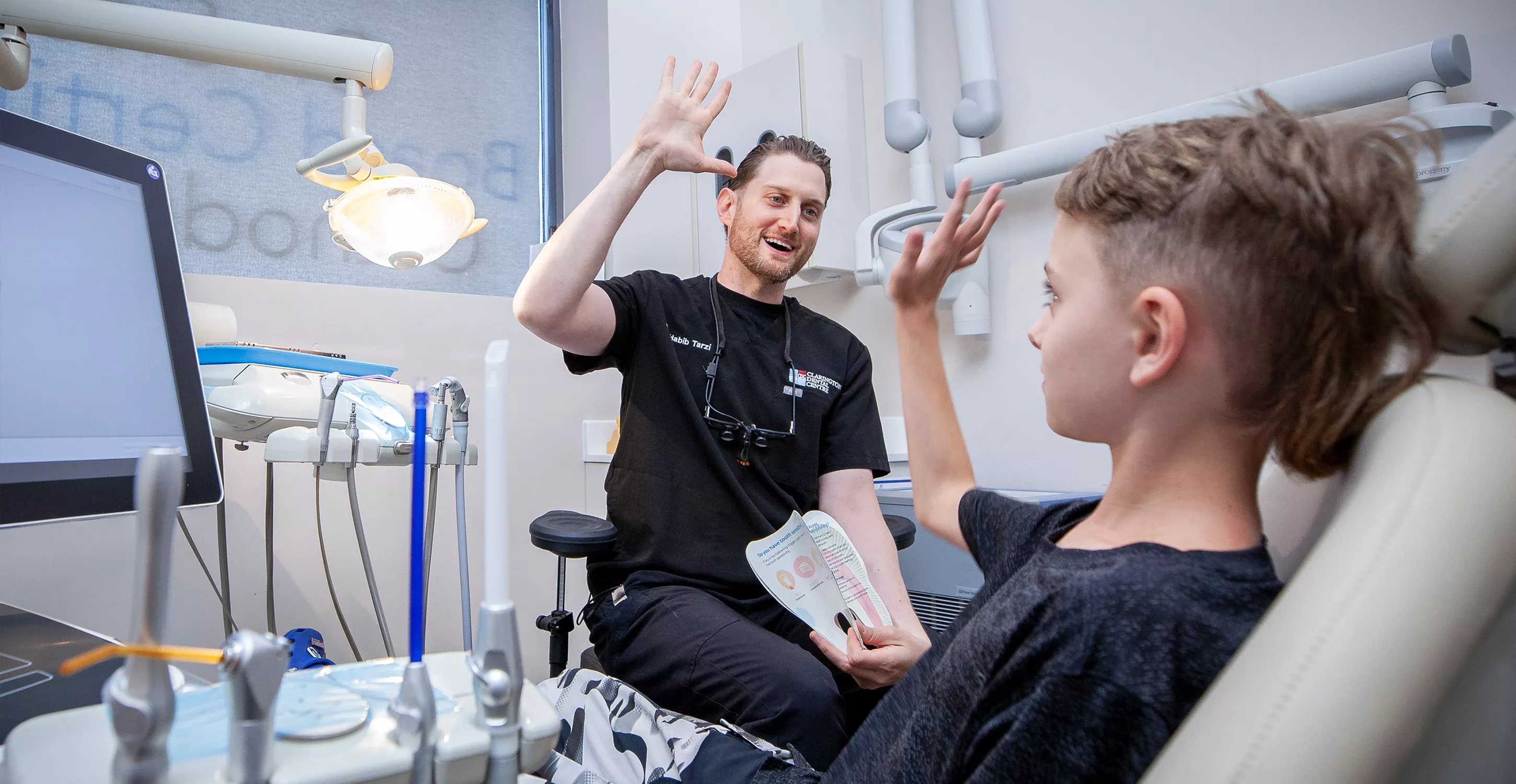 Doctor giving patient a high five